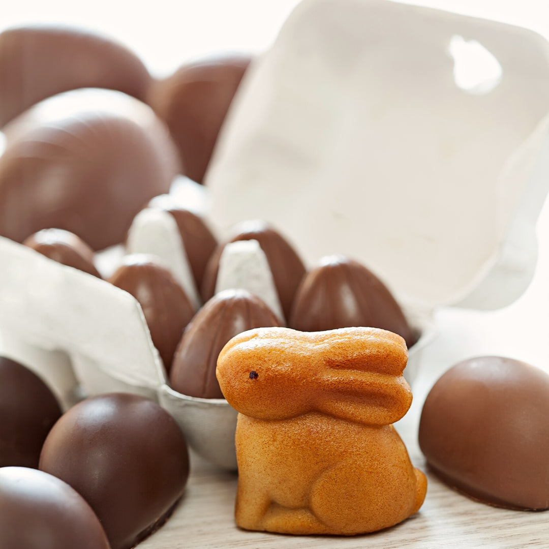 homemade easter chocolate eggs in egg carton with little bunny