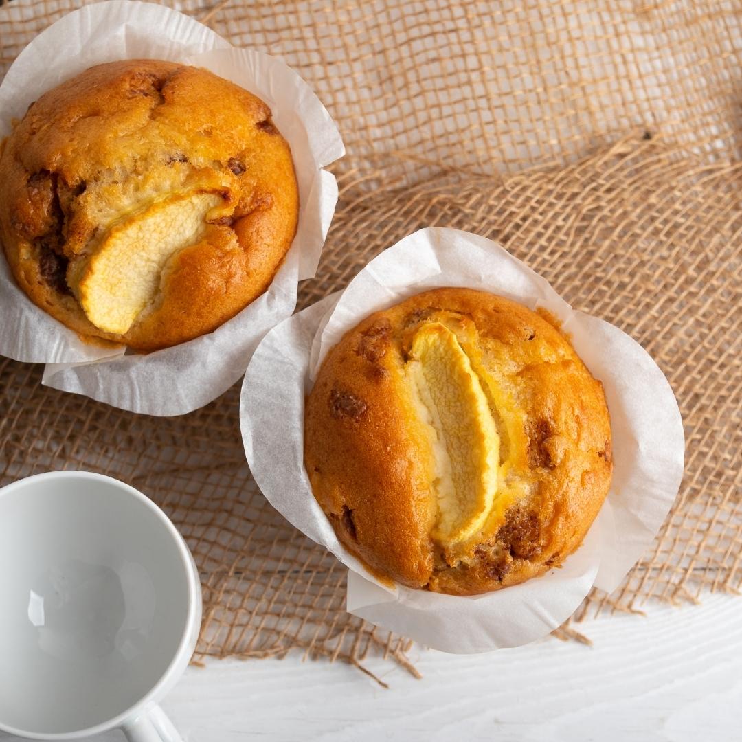 apple muffin on burlap with with coffee cup