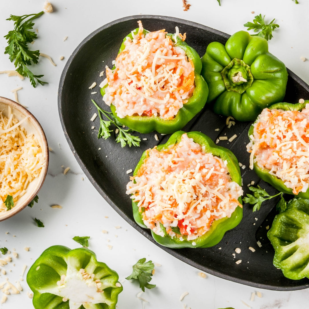 stuffed bell peppers with cheese pn black plate